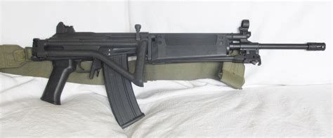 The only R4 parts on the build are the hand guard and the grip. . Galil r4 parts